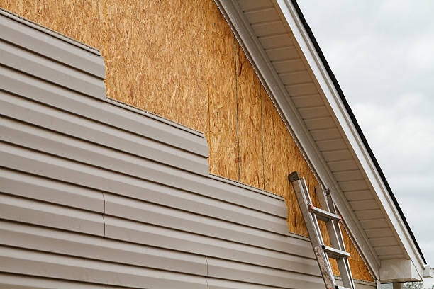 Professional Emergency Siding Repair technician working in Auburndale, MA
